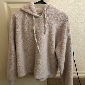 Crème colored sweater.